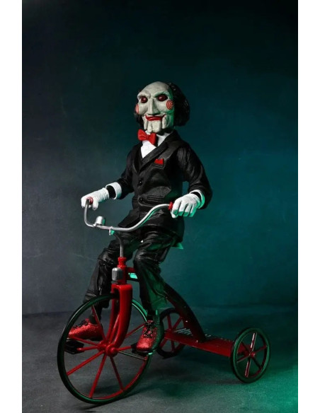 FIGURA NECA SAW BILLY THE PUPPET CON TRICICLO CON SONIDO 30cm